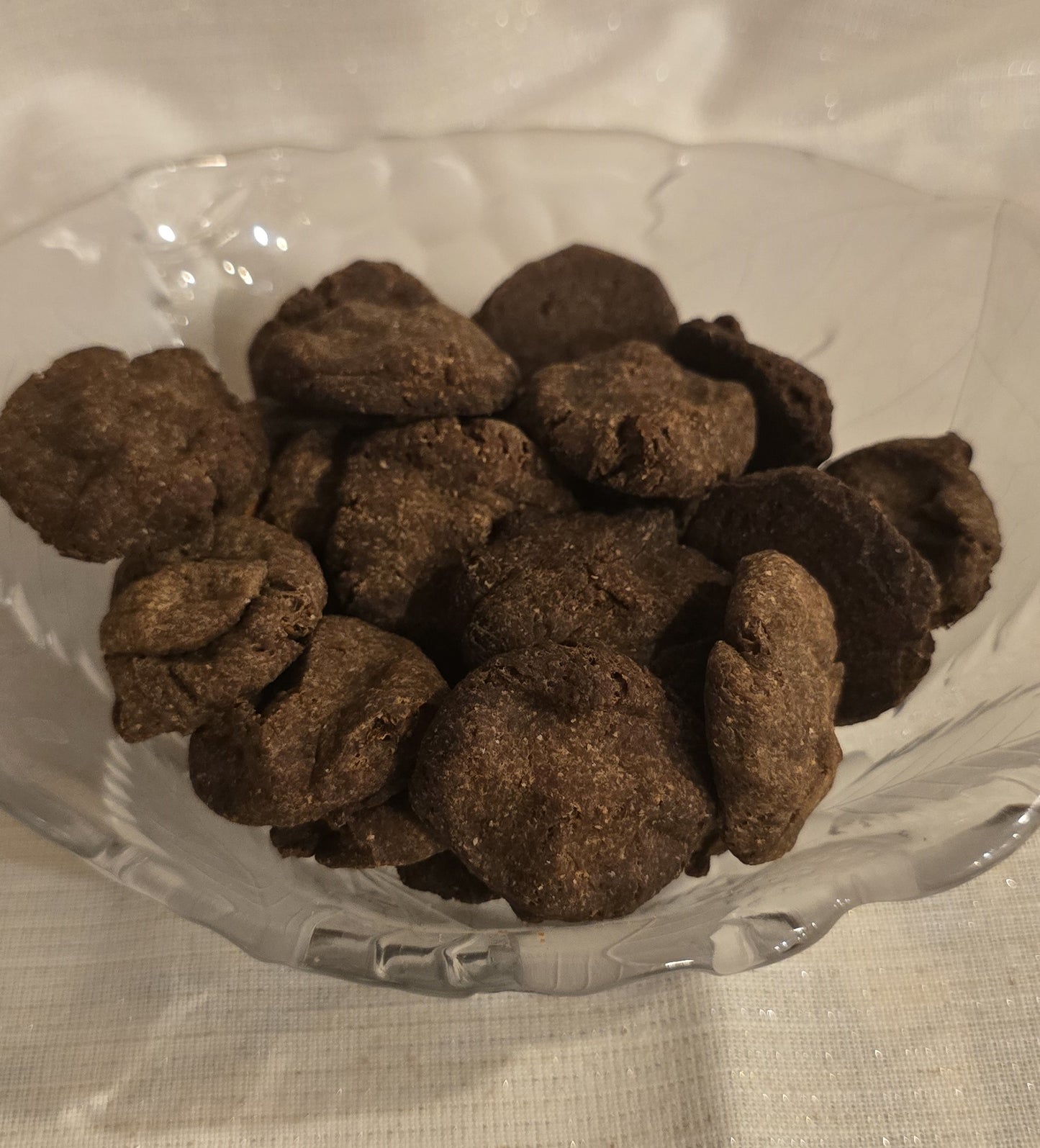 Healthy and Delicious carob dog cookies created in a home kitchen made for dog of all kinds. Always made with real ingredients no artificial flavors here.