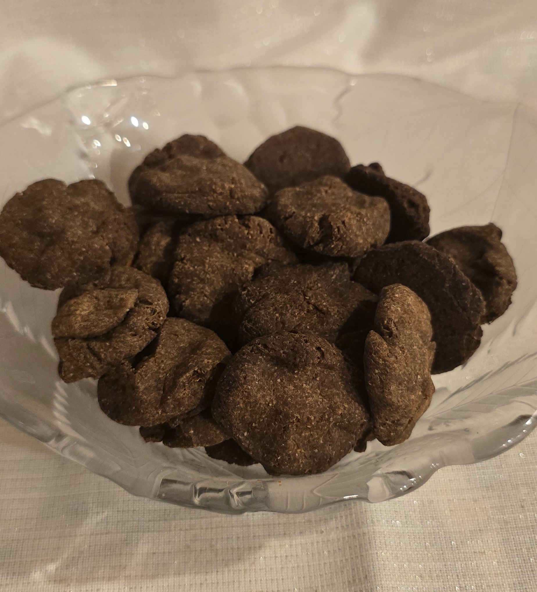 Healthy and Delicious carob dog cookies created in a home kitchen made for dog of all kinds. Always made with real ingredients no artificial flavors here.