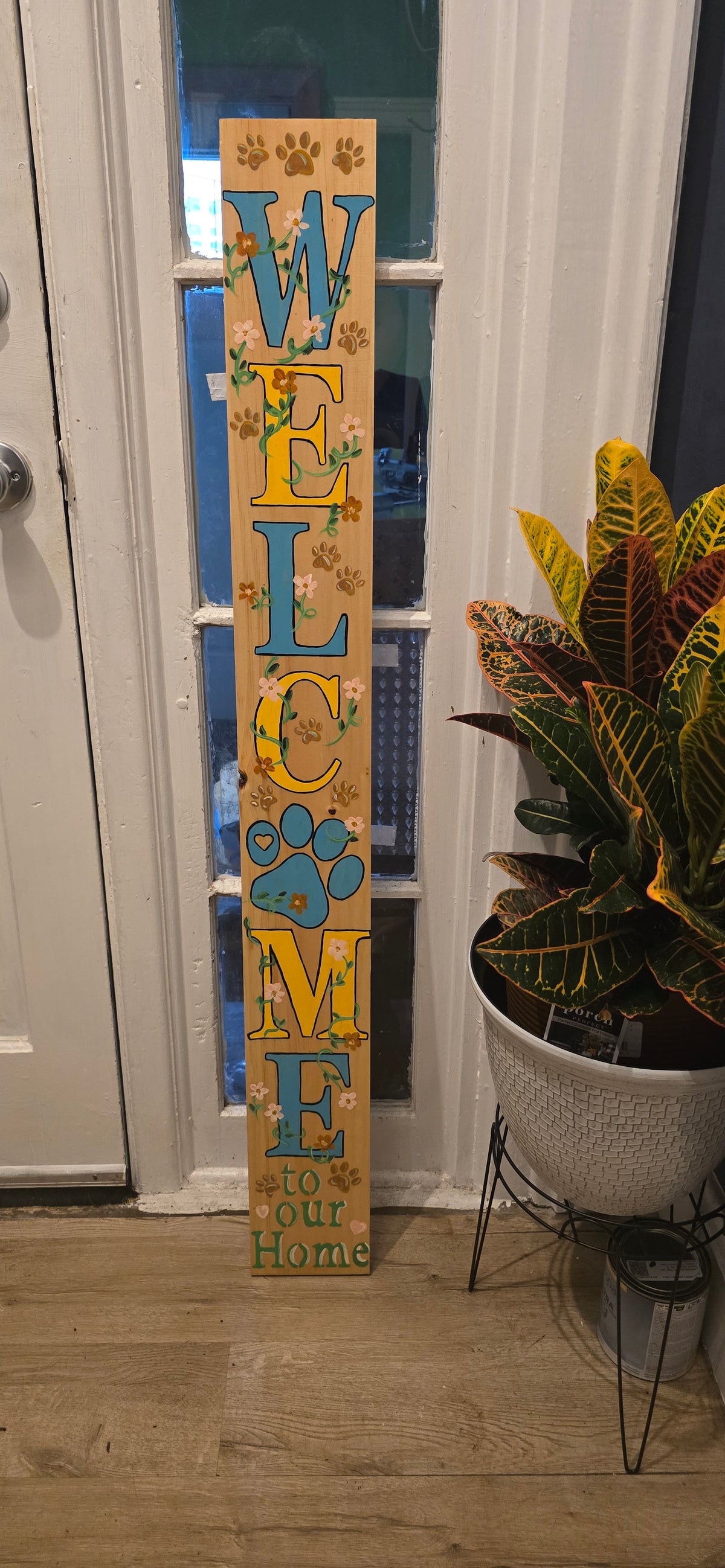 hand painted WELCOME sign